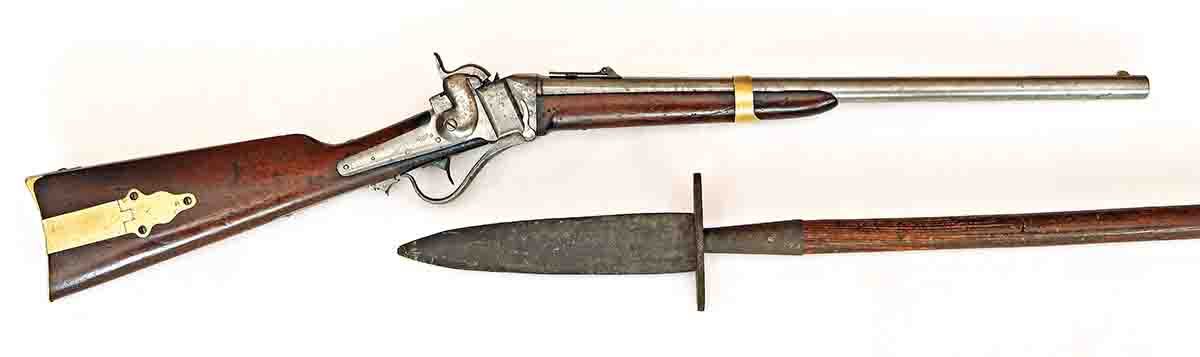 Model 1853 military carbine, and a full-length pike from the abolitionist John Brown, with assembly number 175. The three parts for each pike were given the same assembly number so they could be disassembled for shipment to avoid suspicion, and then reassembled correctly for use at Harpers Ferry, Virginia. The handles were boxed together as “farm implement handles.”